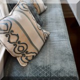 D16. Cushions with custom upholstery. About 84” long. 